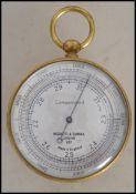 A vintage 20th century Negretti & Zambra compensated aneroid pocket brass surveyor's barometer,