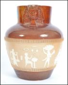 A 19th century Doulton Lambeth stone wear salt glazed Egyptian harvest jug depicting scenes of