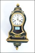 A good French style lacquered mantel clock by Schmid. The 8 day movement striking on a ball with