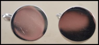 A pair of gentleman's silver cufflinks complete in the presentation case