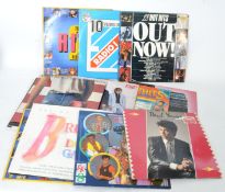 A collection of long play records to include various artists such as ELO on green vinyl, Bee Gees,