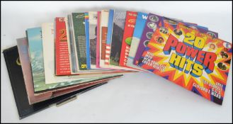 A collection of vinyl long play LP's together with a selection of 45 rpm vinyl singles to include