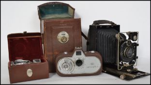 A vintage early 20th century leather cased Zeiss Ikon Maximar 207/7 bellows plate camera together