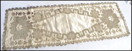 A stunning early 20th century silk and white metal thread embroidery panel believed to be mid