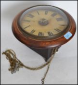 A Victorian mahogany postmans station clock striking on a bell complete with the weights and chains.