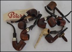 A good collection of vintage 20th century pipes. Consisting mainly of pipes by K & P Peterson, to