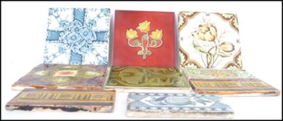A group of 19th century Victorian tiles to include 5 square and 4 edging tiles in Art Nouveau and