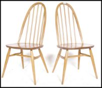 A pair of Ercol golden dawn beech and elm Quaker s