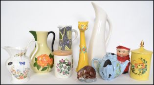 A collection of ceramics to include a Laholms Keramic jug, an Italian Bristolia cat, a Goebels