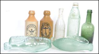 A group of 9 vintage ginger beer and codd bottles including Bawden of Ilfracombe, Yacht of Exeter,