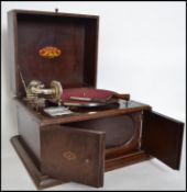 A vintage early 20th century cased table top Gramophone by Lord, the top opening to reveal the