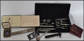 A dealers lot to include a good cased Maths set, rules, needlecase, Autograph book, 2 silver