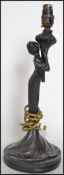 A 20th century Art Deco bronze table lamp in the f