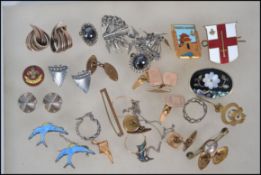 A collection of yellow metal gents cuffs ( untested) white metal clip on earrings, gold creole