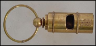 A believed 20th century brass whistle adorned with White Star Line markings ( please see