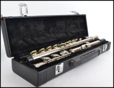 Musical Instruments. A good cased Lindo flute 10-F