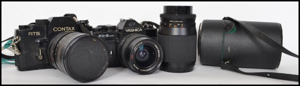 A vintage cased  35mm Contax RTS camera fitted with a Super Paragfon PMC Auto Lense, a Yashica FX-