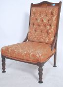 An Edwardian mahogany ladies nursing chair / armch