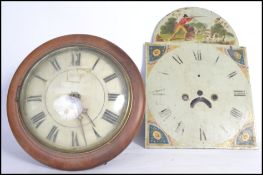 A vintage early 20th century postman's clock striking on a bell with a Roman numeral chapter ring