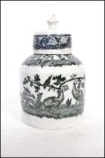 A late 18th century black transfer printed tea caddy probably Staffordshire, the base bearing