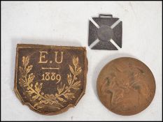 A 19th century French bronze medallion plaque for the Exhibition Universal 1889 along with another