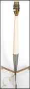 A retro / vintage mid 20th century atomic rocket table / desk lamp. Stood on  brass tripod feet with