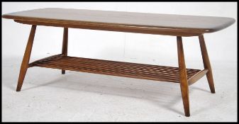 A contemporary Ercol Windsor pattern golden dawn beech and elm wood rectangular coffee table being