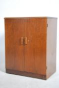 A vintage mid century HMV record cabinet complete
