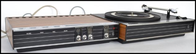 A retro 1970's teak cased Philips record deck toge