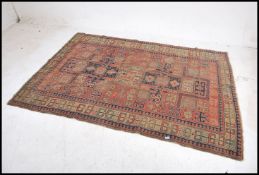 An early 20th century Bokhara Persian rug of handw