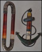 Two vintage silver and agate brooches of believed military origin on in the form of an anchor with