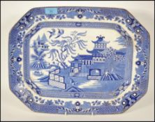 A 19th century Burleigh Ware, Burslem England ' Willow ' pattern blue and white meat platter in