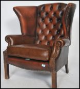 An Antique style mahogany &  leather upholstered C