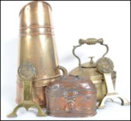A collection of copper and brass wares to include a large coal scuttle , a tea pot, a unusual