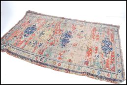 A large early 20th century handwoven Islamic / Per