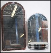 A 1930's Art Deco peach glass Venetian style mirror together with an arched mirror with mirror