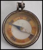 A small miniature hallmarked compass ( see illustrations )