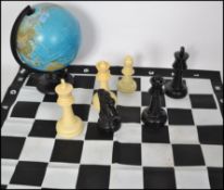 A vintage 20th century Italian Orion 25 globe lamp along with an oversized out door chess set and