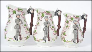 A set of 3 mid 19th century Staffordshire Crimean war jugs of graduating form. Each with trunk and