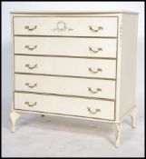A Louis 16th style painted shabby chic bachelors chest of drawers having a bow front and raised on