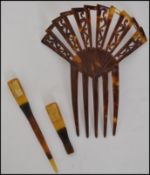 An Art Deco Japanese celluloid hair comb in the form of tortoiseshell together with two  similar
