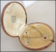 A believed World War One sweethearts brooch of naval interest. The twin pin brooch united by a chain