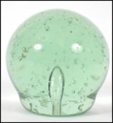A large believed 19th / early 20th century Nailsea green glass control bubble dump / paperweight