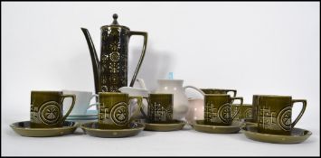 A vintage Portmeirion coffee service comprising cups, saucers, teapot etc together with a Poole