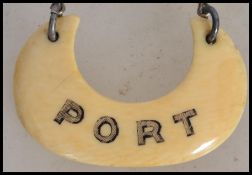 An early to mid 19th century ivory wine label on c