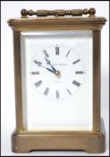 A good Matthew Norman brass cased carriage clock. The clock housed within a simple case with eight