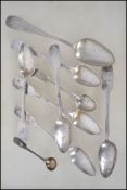 A collection of silver spoons to include continental 750 marked spoon and a series of spoons with