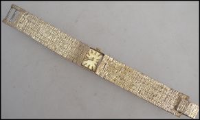 A 20th century ladies gilded silver 925 bark effect bracelet wristwatch - dress watch. The square