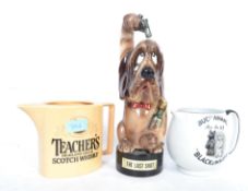 A group of breweriana to include a The Last Shot dog committing suicide bottle with stopper, a