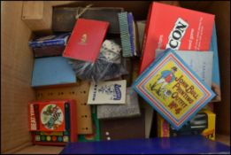A large collection of vintage board games to include a sealed Dungeons and Dragons, various packs of
